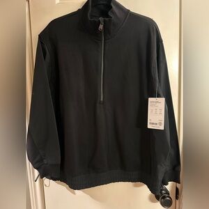 Athleta - TRIUMPH HYBRID
HALF ZIP SWEATSHIRT